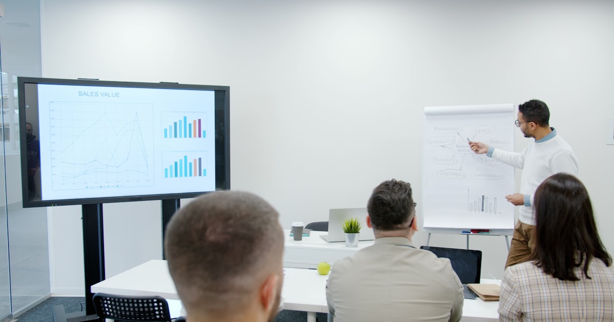 Leadership trainer in Ajax leading an on-site training session with a small group