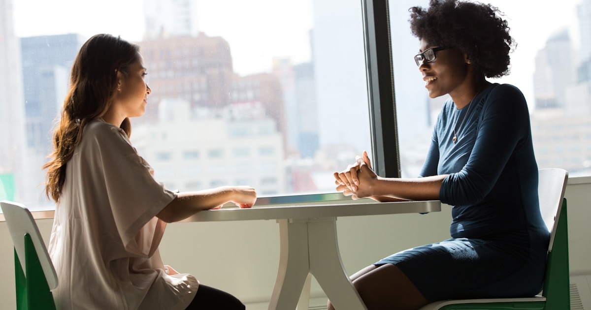 A manager and an employee having a one-on-one career conversation, the habit that helps employers retain top talent in the GTA