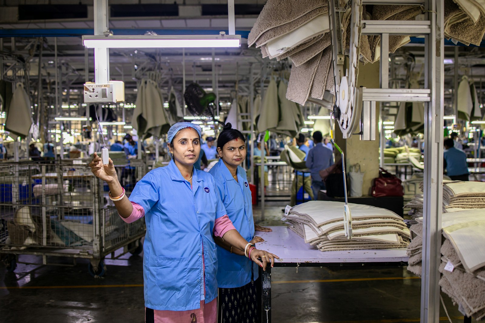 Two supervisors overseeing a production floor, manufacturing leadership development for Oshawa plants
