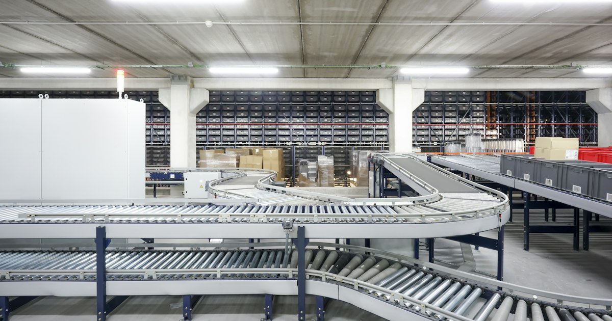 Warehouse conveyor line, the kind of process Ajax and Whitby teams map first in workflow optimization